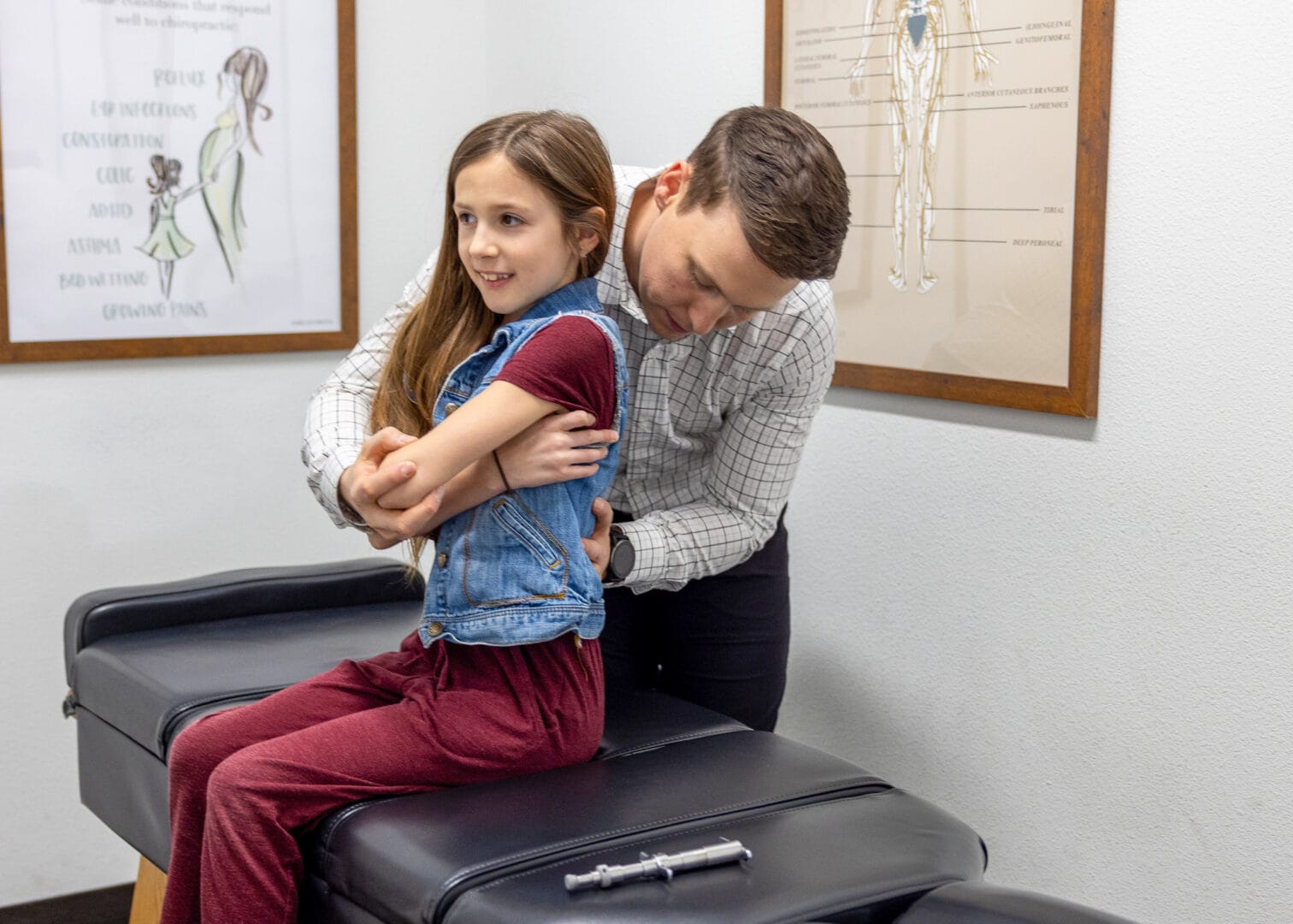 Pre-teen child receiving gentle chiropractic care for posture and sports recovery at Restoration Chiropractic in Prosper, TX