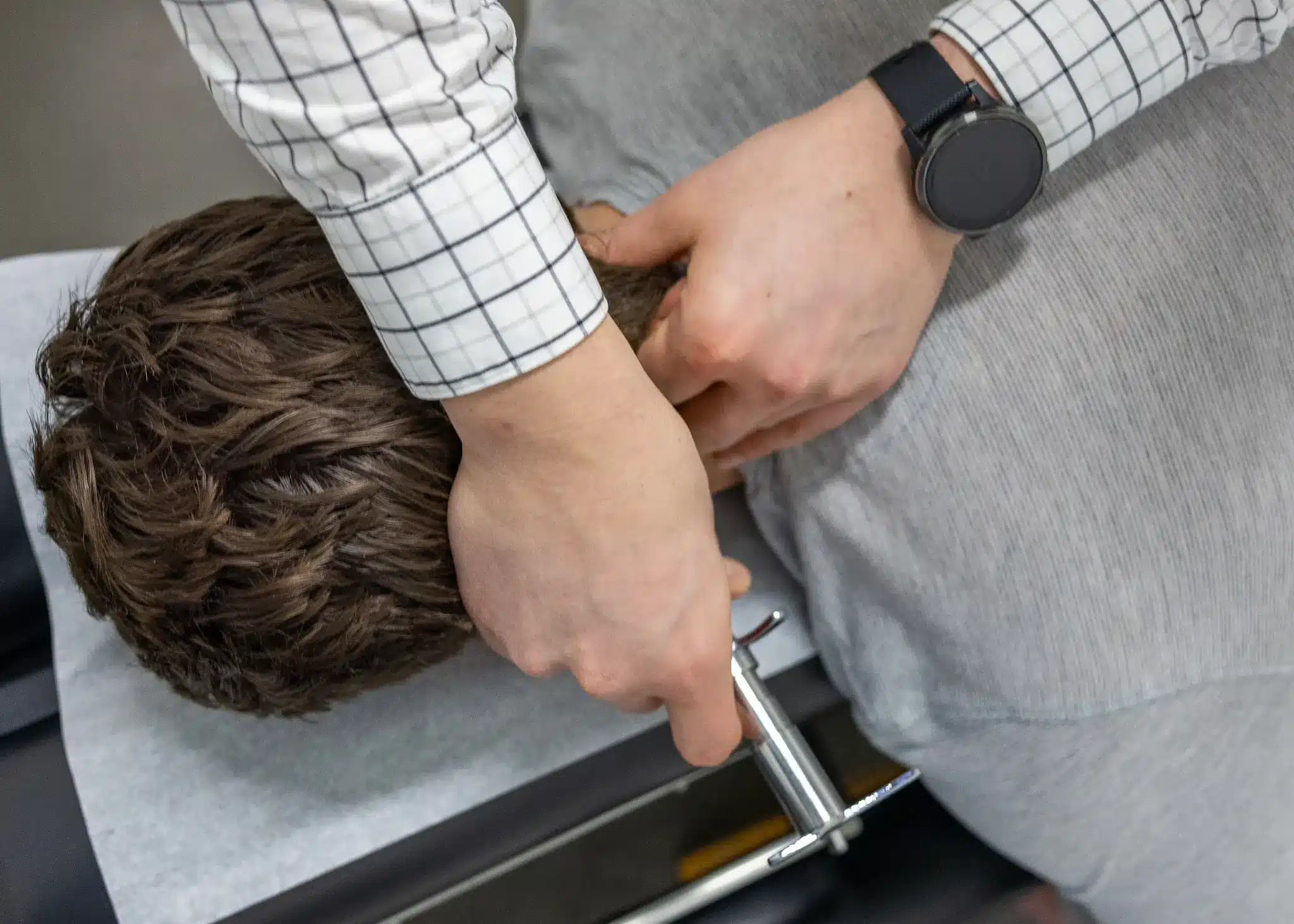 Close-up of the Integrator instrument used for Torque Release Technique adjustments at Restoration Chiropractic