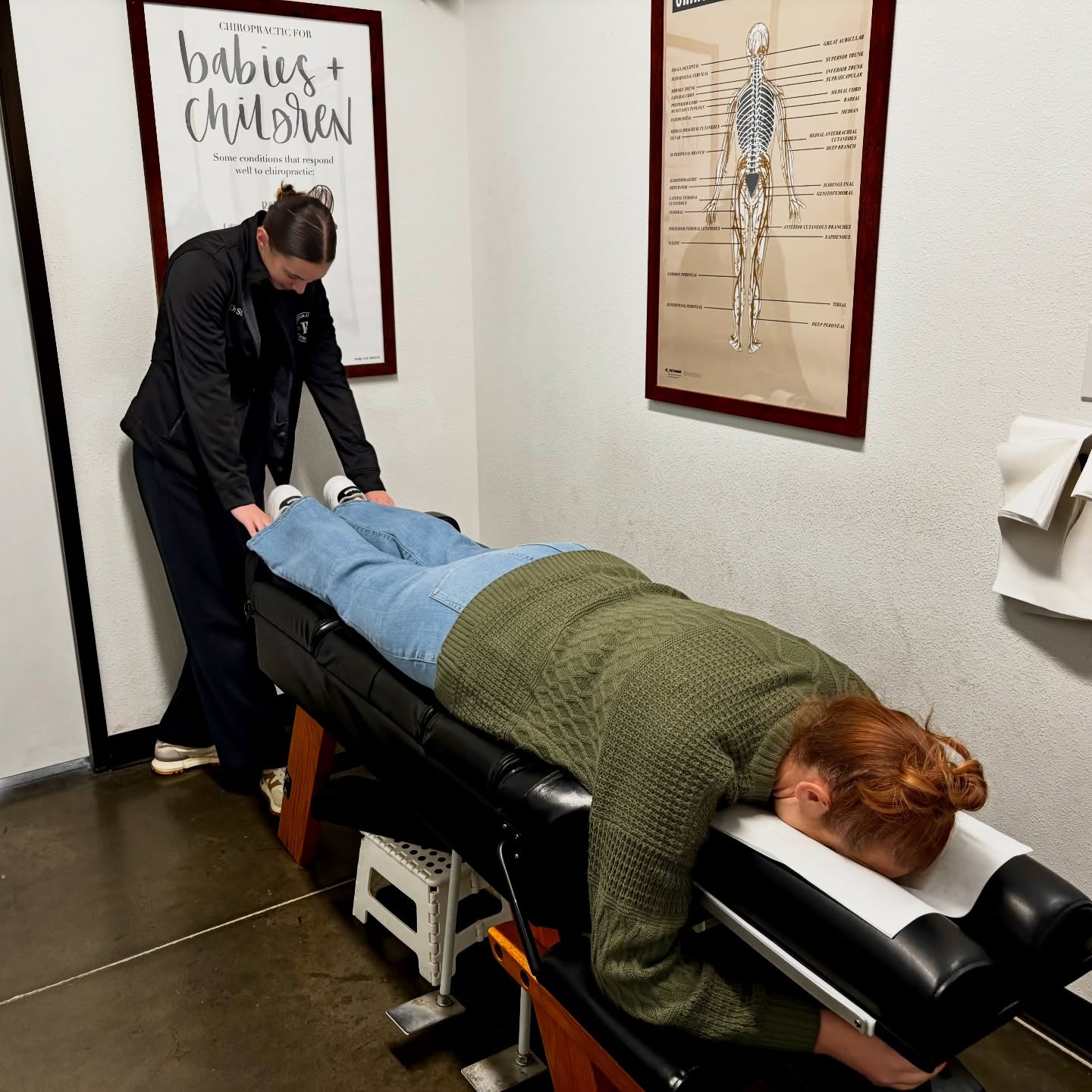 Prenatal chiropractor in Prosper, TX adjusting an expecting mother with the gentle Webster Technique